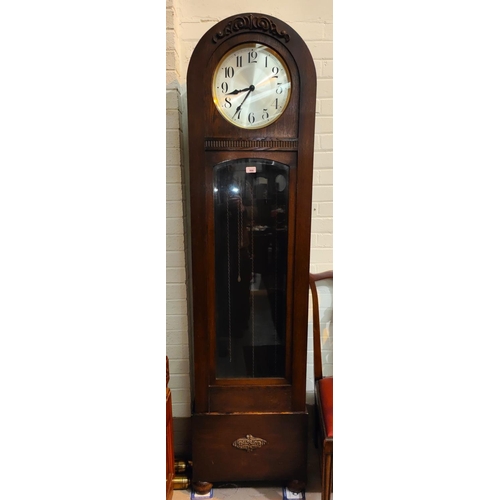 998 - A 1930's grandfather clock in oak dome top case, with triple weight driven movement, height 194cm