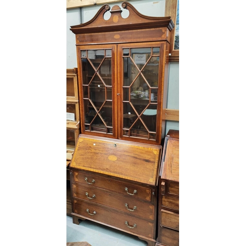 1005 - An Edwardian Sheraton style mahogany bureau bookcase with inlaid pattern and satinwood banding, 92m