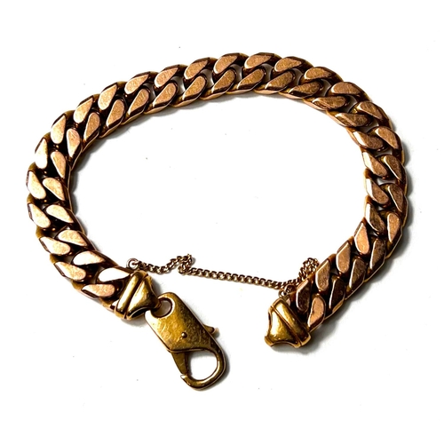 695 - A gent's 9 carat hallmarked gold identity bracelet formed from flattened curb links, 48gm