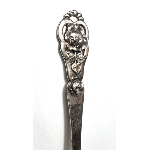 830 - A Scandinavian large planished spoon with pierced flower terminal, stamped 830, NM