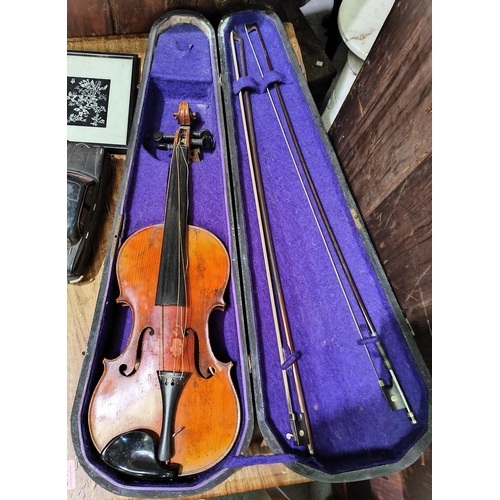 336A - A late 19th early 20th century two piece back violin, bearing paper label for Copie de Antonius Stra... 