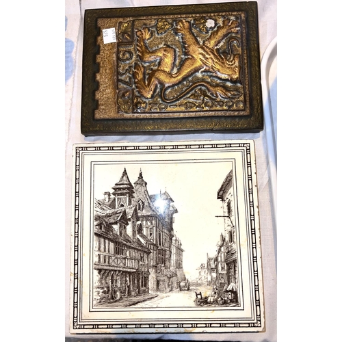 523 - A 19th century pair of Minton's tiles featuring scenes in York, 20cm square; a Mallein 1937 plaque (... 