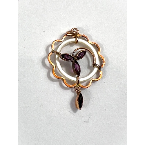 824 - An amethyst & white enamel pendant, stamped 9ct