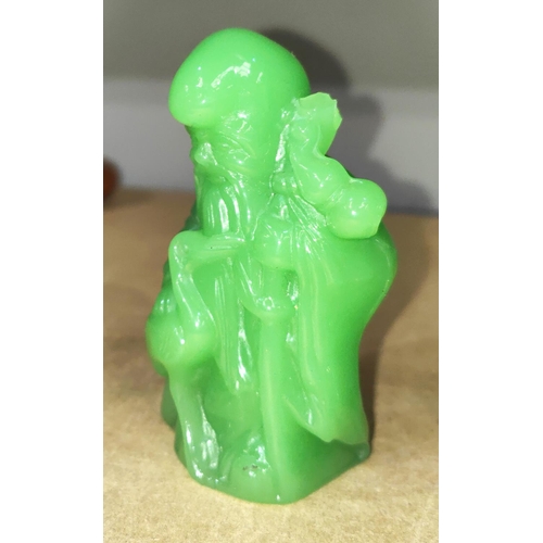 365B - A Chinese jade coloured glass figure of Sage (a.f)