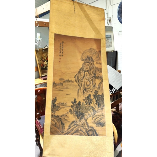 385 - A Chinese scrolling print of mountain scene with signature to top left, 103x58cm