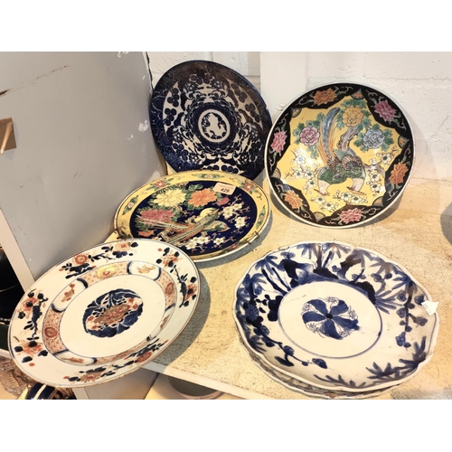 429 - A Chinese Famille jaune dish and a selection of Chinese and Japanese dishes vases etc of various des... 