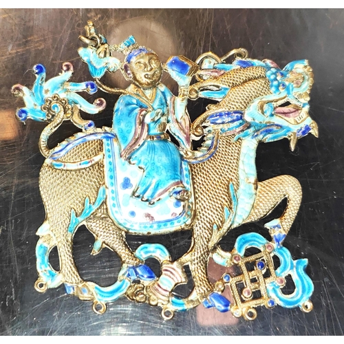 454 - A Chinese white metal dragon pendant with blue enamel decoration to both sides, length 9cm