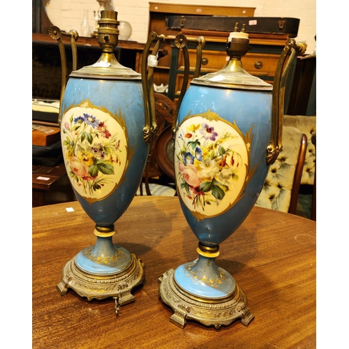 503 - A pair of Ormolu & Sevres porcelain 2 handled classical urn shaped table lamps with polychrome o... 