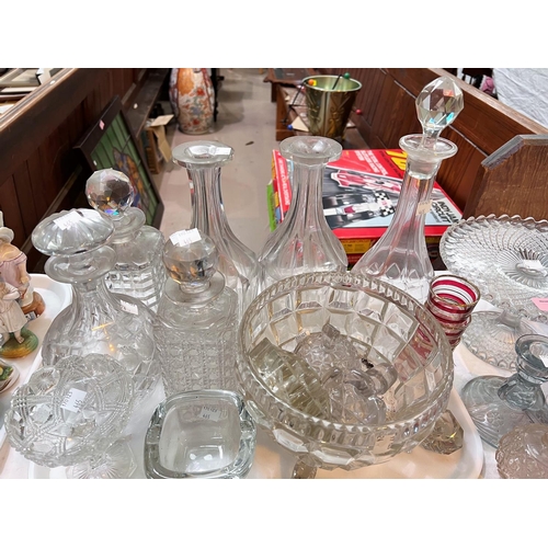 465 - A selection of cut and sliced decanters, other various glassware 