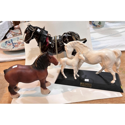 496C - A Beswick group 'Spirit of Affection'; a Beswick bisque bay horse, length 23cm and a shire horse wit... 