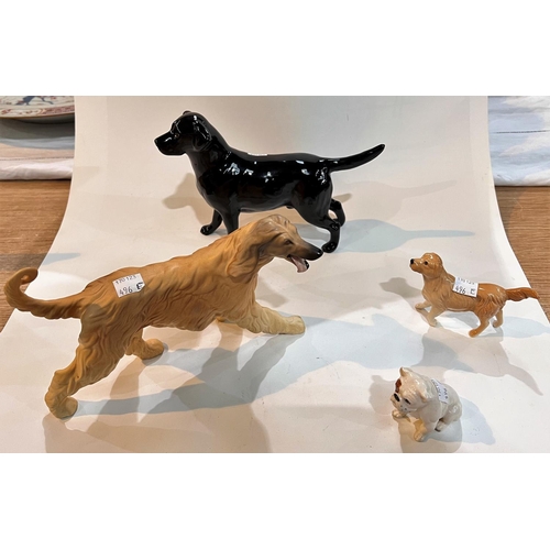 496E - A Beswick bisque Afghan hound, length 22cm; a Beswick black Labrador, length 22cm; a Beswick Golden ... 