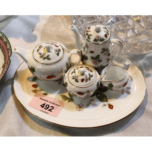 492 - A miniature Wedgwood Wild Strawberry tea/coffee service with tray and a lidded trinket bowl, a Wedgw... 