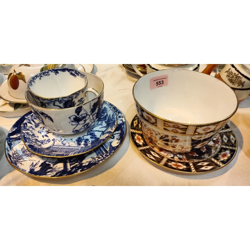 553 - A Royal Crown Derby blue and white trio set, two similar pieces