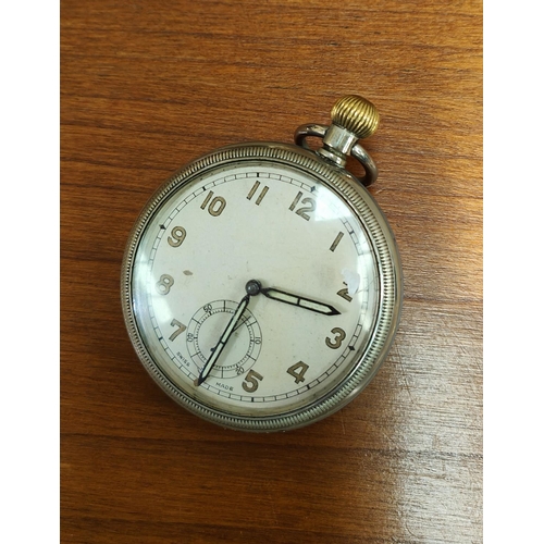 622A - An early/mid 20th century military keyless open faced pocket watch, stamped: 