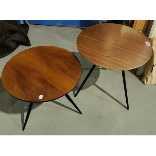 966 - A 1960's pair of occasional table with circular tops, on triple legs