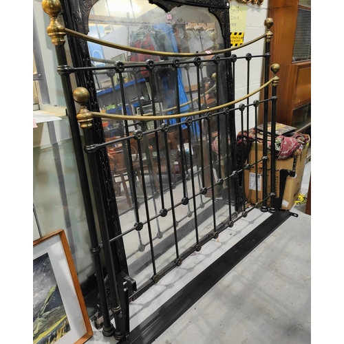 981 - A Victorian style pair of king size bed ends in brass and black