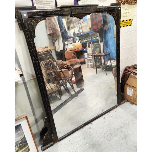 1017 - A large over mantel mirror, Edwardian/Victorian black lacquer finish with gilt inlay