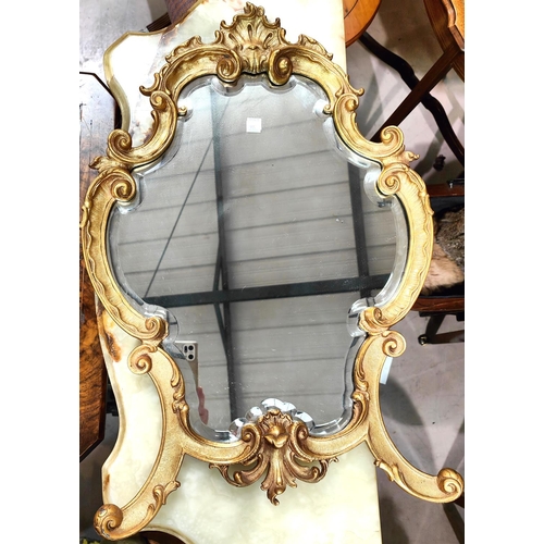 905 - A period style side table in ornate gilt metal with onyx top; similar mirror