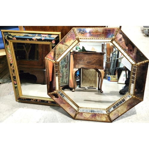 916 - An octagonal wall mirror in antique effect mirrored frame; a rectangular wall mirror in floral frame