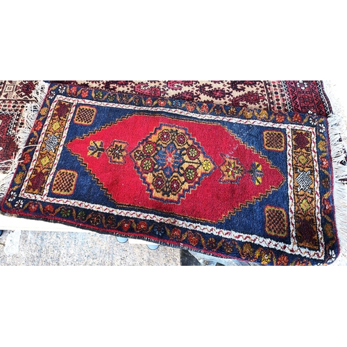 940 - Two prayer rugs with varying designs, 142x71cm 90x50cm