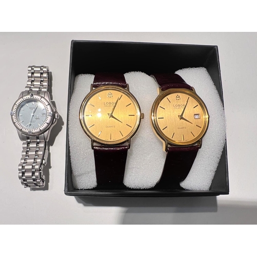 698 - A ladies Sekonda wristwatch with quartz movement, boxed; a pair of Lobor quartz dress watches, boxed