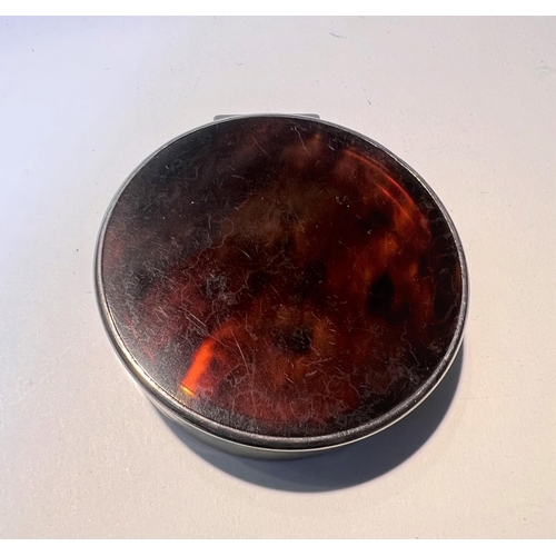 752D - A hallmarked silver and tortoise shell circular pill box