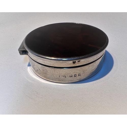 752D - A hallmarked silver and tortoise shell circular pill box