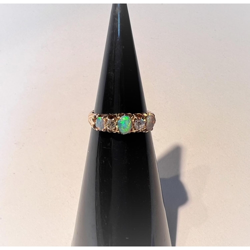 752K - An 18ct gold opal and diamond set ring, three opals and two diamonds alternating, size J