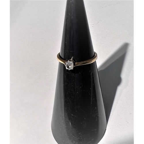 786 - A diamond solitaire ring, the shank stamped '18ct'