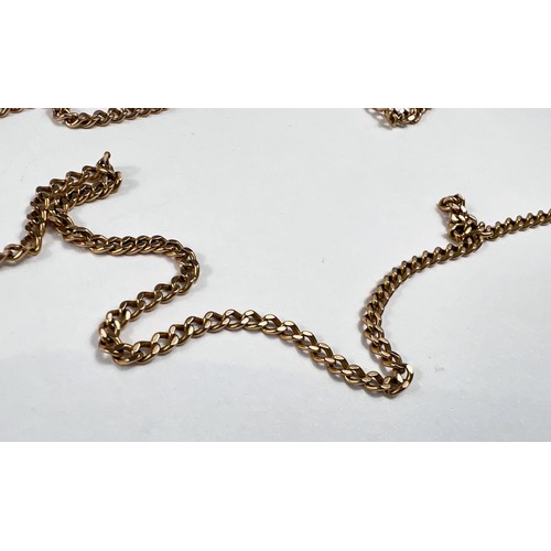 710 - A yellow metal fine curb link chain (tests as 9ct, unmarked) 7.1gm, length 26