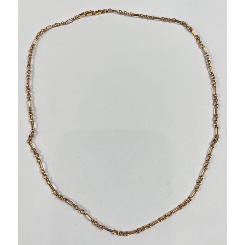 711 - A 9ct  yellow gold chain formed from alternating triple and elongated links, st. 375, 11.4gm, length... 