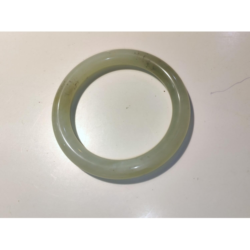 645A - A Chinese jade coloured hard stone bangle 