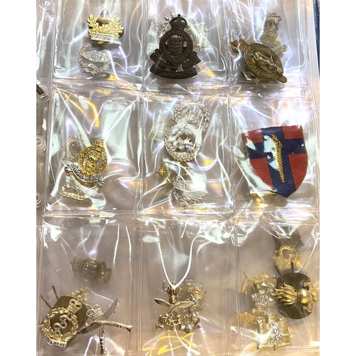 387 - A collection of military badges