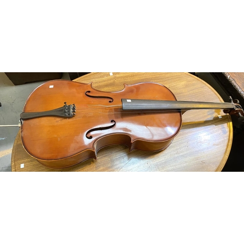 14 - A Modern good quality full size cello with two piece back, scrolling head decoration, L122cm