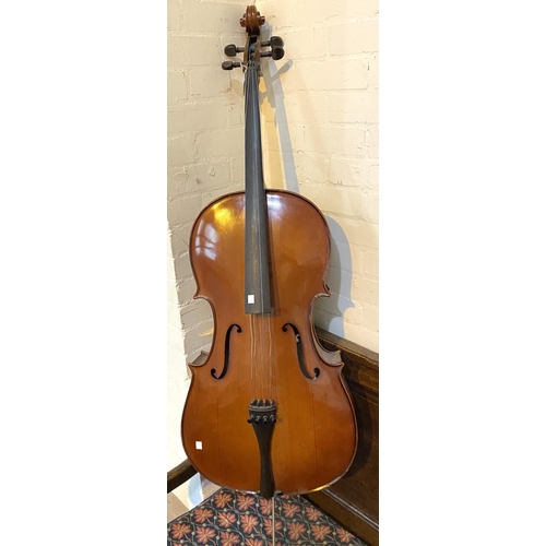 14 - A Modern good quality full size cello with two piece back, scrolling head decoration, L122cm