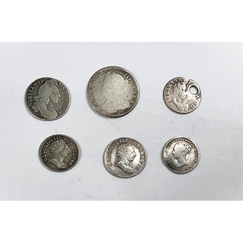 181 - A Queen Anne 1/- and a 1697 6d; four various Maundy coins (2 holed)