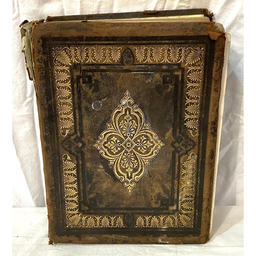 20 - A large leather bound family bible with gilt highlights etcNo bids sold with next lot