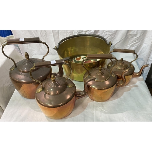 29 - Four copper kettles; a jam pan