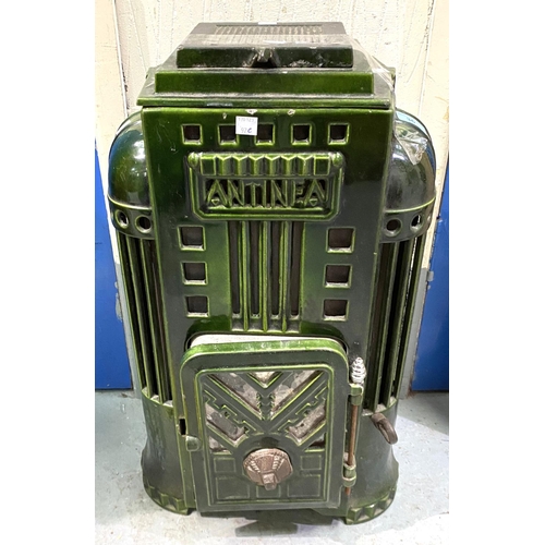 36 - An Art Deco style log burning stove with single door, in green enamel by Antinea, height 62cm, width... 