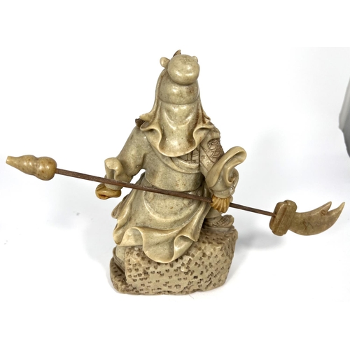 400 - A carved ivory coloured soapstone depicting a Chinese General with lance height 21cm