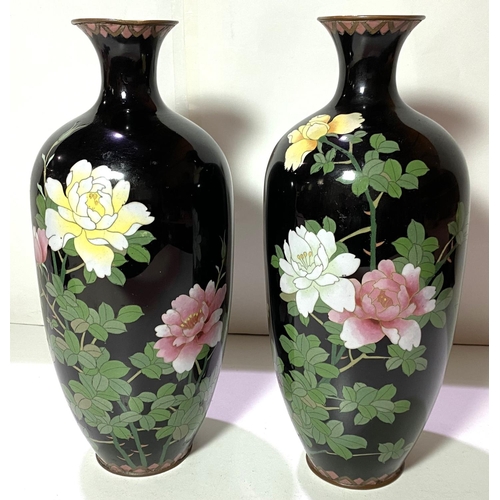 406 - A pair of Japanese dark blue ground cloisonne baluster vases decorated with flowers height 31cm (som... 