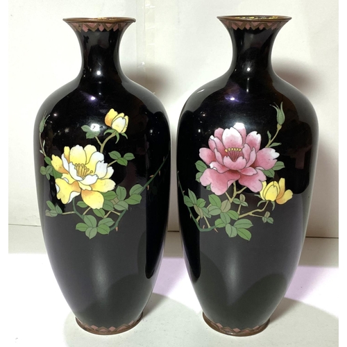 406 - A pair of Japanese dark blue ground cloisonne baluster vases decorated with flowers height 31cm (som... 