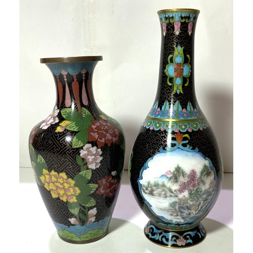 409 - 2 Chinese cloisonne vases decorated with flowers against a black ground heights 27 & 23cm (both ... 