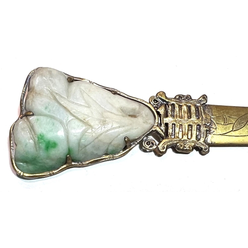 417 - A 17th/18th century carved jade pendant mounted in 19th century silver gilt Chinese paper knife (fro... 