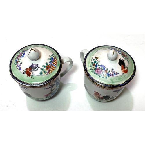 422 - A 20th century Republic Period pair of covered cups decorated with cockerels in landscapes, height 1... 