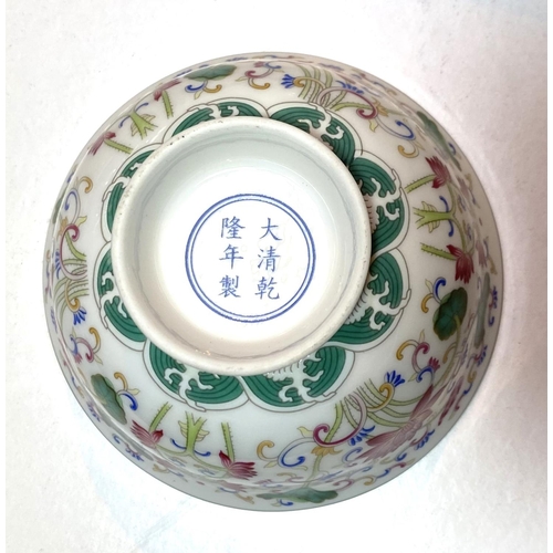 427 - A modern Chinese blue & white teapot with inset rice grains; a modern rice bowl decorated in pol... 