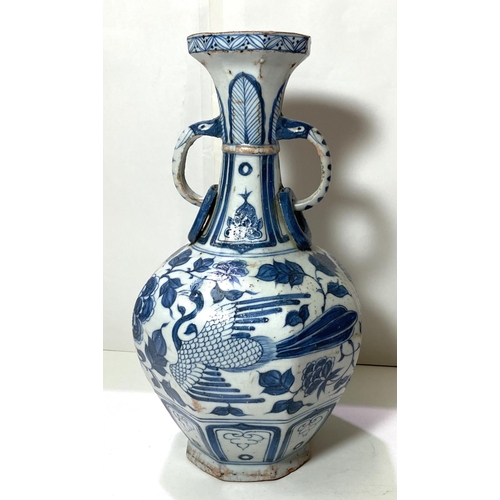 432 - A Chinese blue and white vase in the Yuan manner decorated with birds and double handle, ht. 34cm