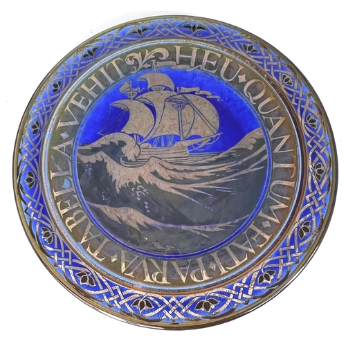 475 - A PILKINGTON'S Royal Lancastrian lustre plaque with ship surrounded by Latin motto, decorated to the... 