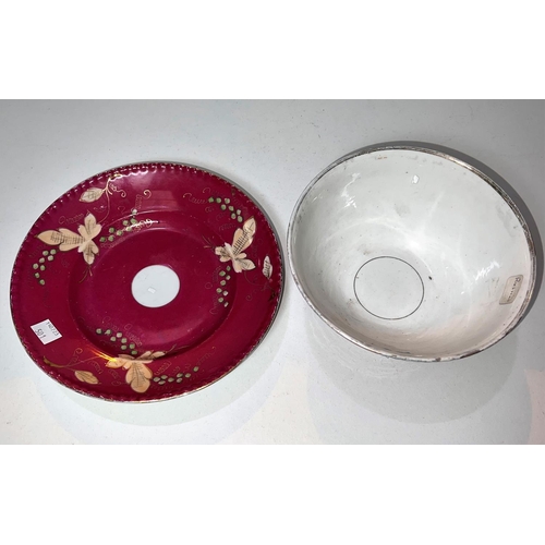 501 - A Kuznetsov porcelain bowl and dish, pink ground with vine decoration, red marks to base