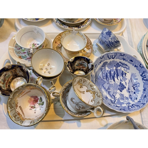 543 - A selection of 19th century cups; saucers; trio sets; etc., includes a Crown Derby example